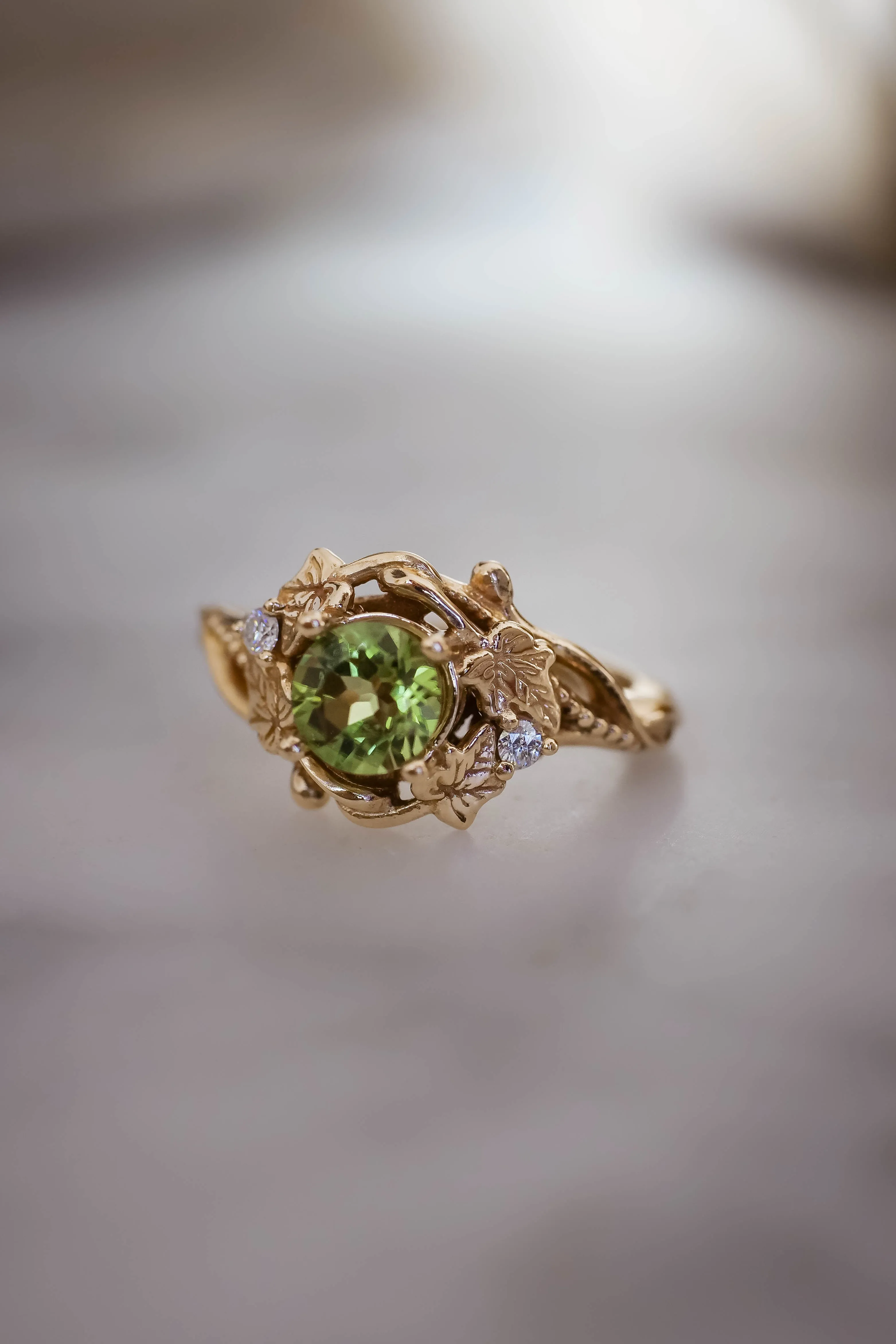 Peridot engagement ring with diamonds / Ivy Undina