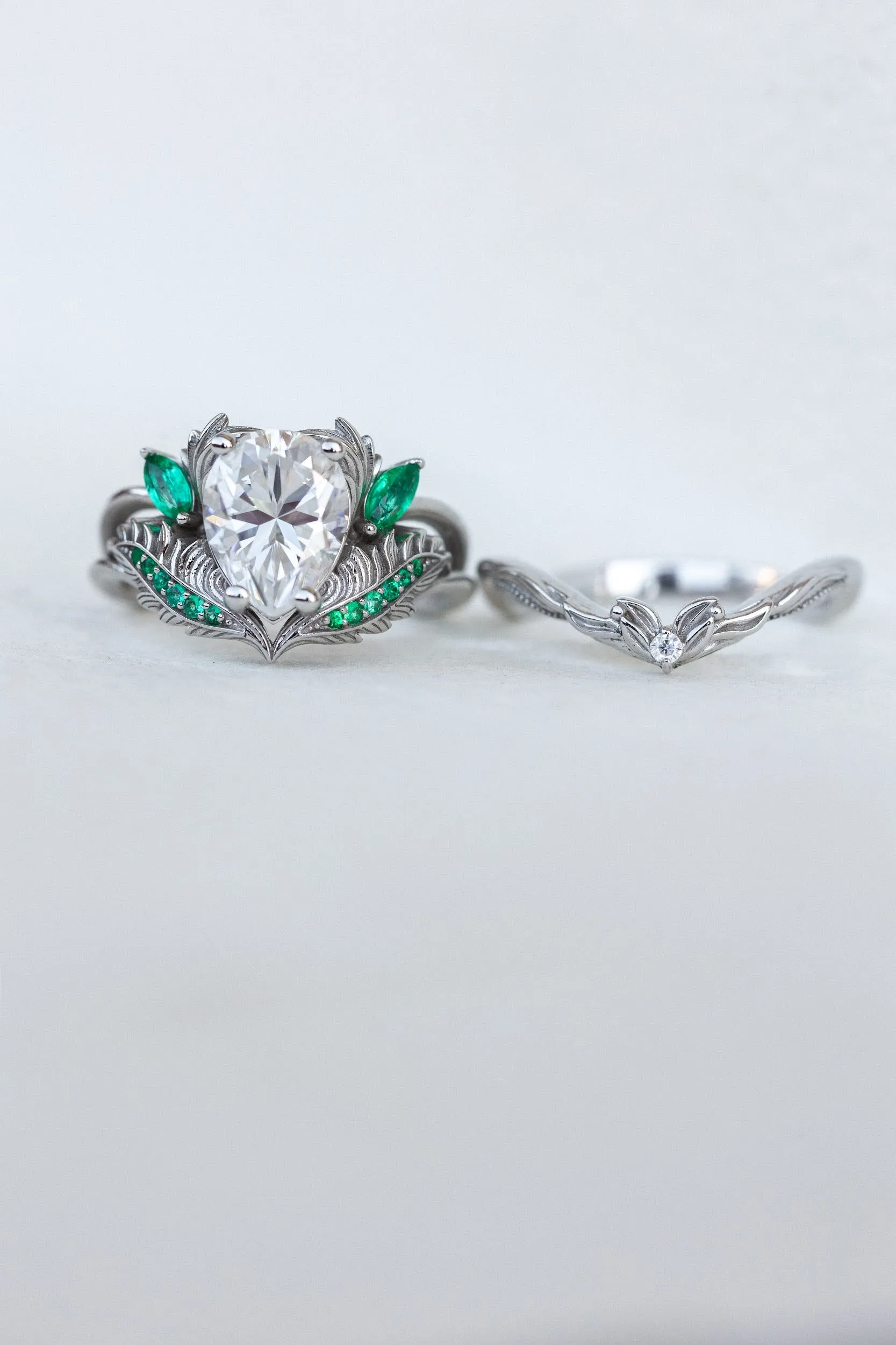 READY TO SHIP: Adonis ring set in 14K white gold, moissanite pear cut 9x7 mm, accent moissanite and natural emeralds, AVAILABLE RING SIZES: 4.25-6.25US