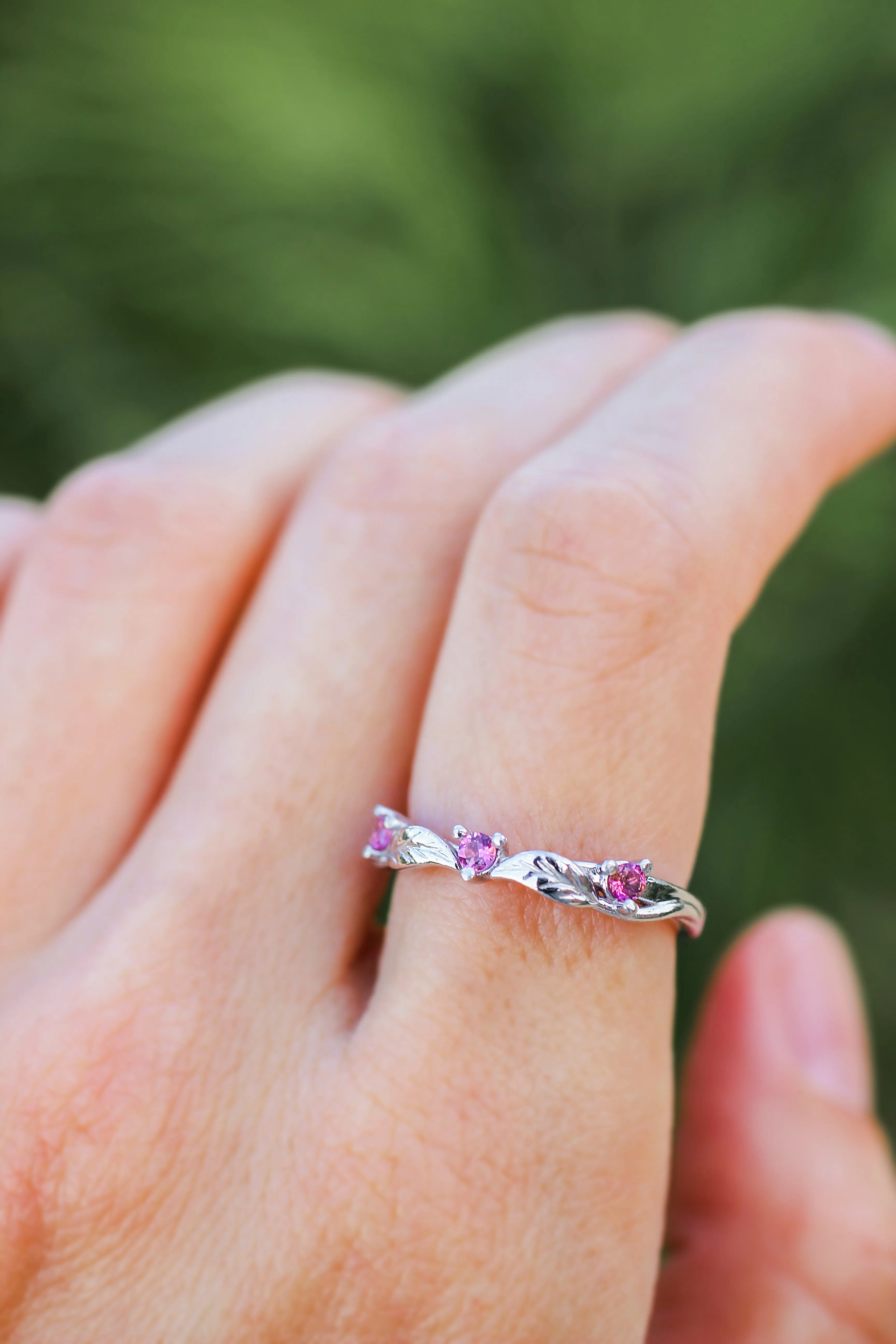 Three pink tourmalines wedding band