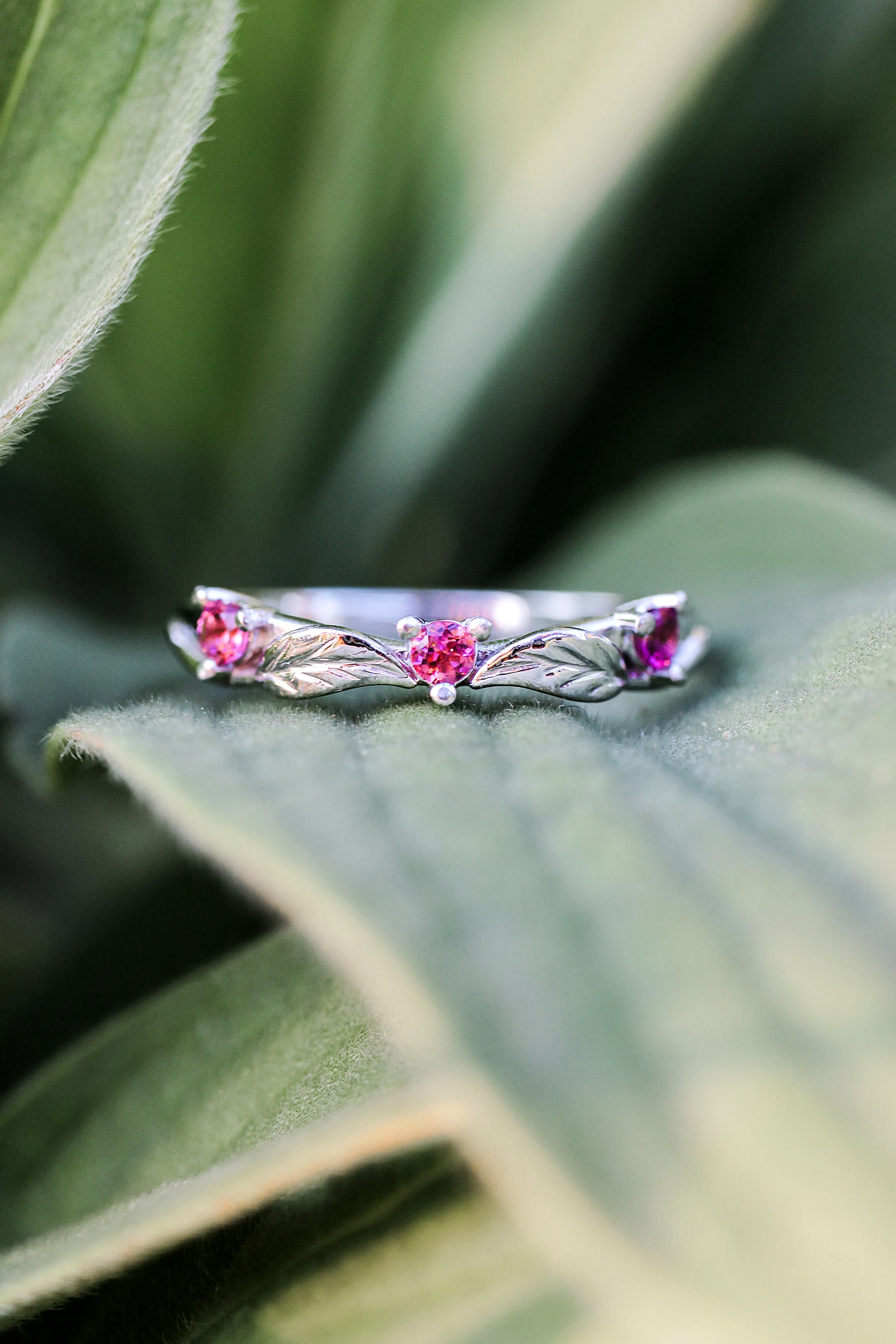 Three pink tourmalines wedding band