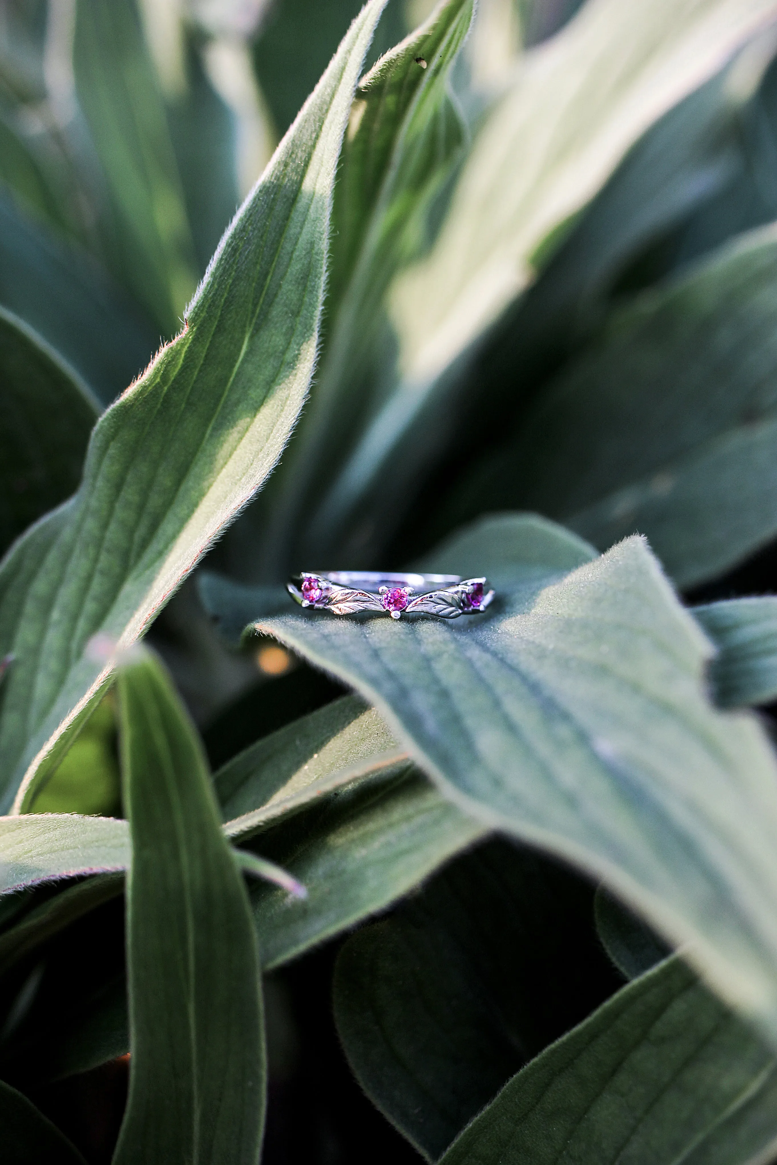 Three pink tourmalines wedding band